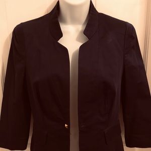 Reposh woman’s jacket. I17 inches from shoulder to sleeve. 15 inches across.